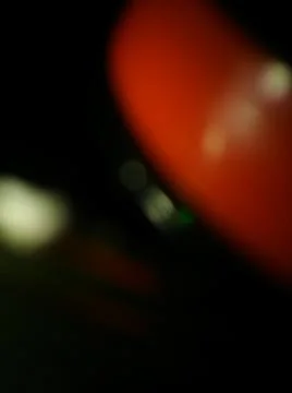 Red shiny background with different elements in a blur effect Stock Photos