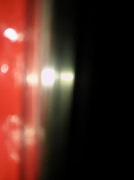 Red shiny background with different elements in a blur effect Stockfoto's