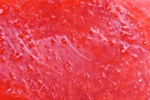 Red shower gel sample, background texture Foto stock