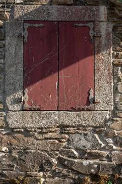 Red Shuttered Window in Rustic Old Stone House in Galicia, Spain Stock Photos