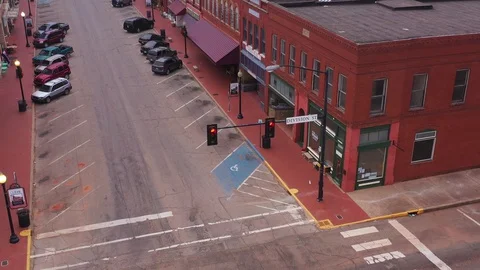 Red Sidewalks and Old Brick Buildings, Guthrie, Oklahoma, USA Stock Footage 129388386
