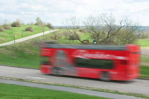 Red sightseeing double deck bus in motion in Quebec city, Canada Foto stock