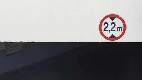 A red sign showing the height of the ceiling of 2.2 meters in the entrance to Stock Photos