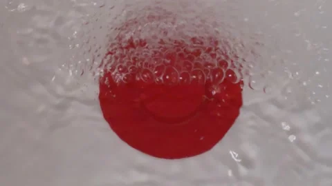 Red Silicone Plug Under Filling Water Close Up, Concept of Stillness and Vídeos de archivo 336470443