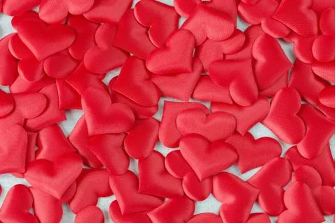 Red silk hearts Stock Photos