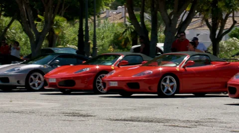 Red &amp; silver ferraris Stock Footage 27575019