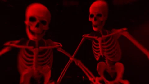 Red Skeletons Scream at Camera Loop Stock Footage 265075693