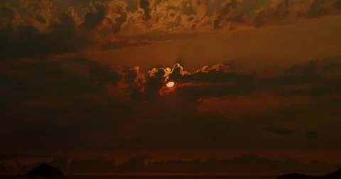 Red skies, Sunset with the clouds falling. Sunset Clouds, Sea Beach Timelapse Stock Footage 241264224