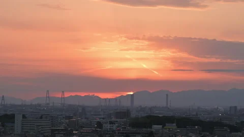 Red sky pan from a high place. Overview of a industrial sunset. Stock Footage 170355946