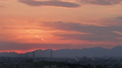 Red sky pan from a high place. Overview of a industrial sunset. Stock Footage 170376582