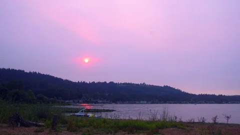 Red sky sunset at a lake Video stock 79752316