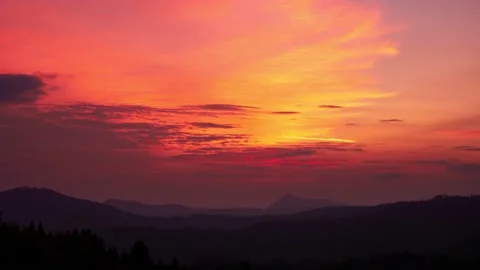 Red sky at sunset, slow moving clouds Stock Footage 168440275