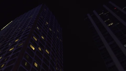 Red Skyscraper with lights, glass windows at business district in Paris at Stock Footage 119367139