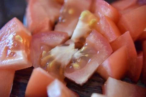 Red slices of tomato Stock Photos