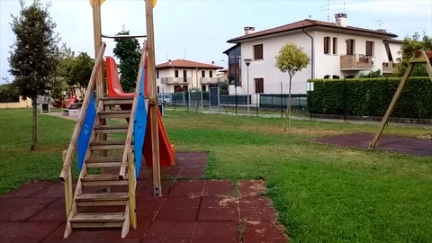 Up to the red slider in a children playground. Stock Footage 92162276