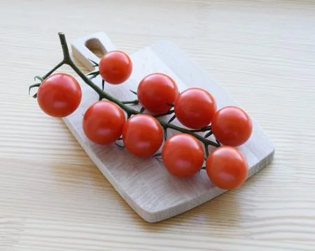 Red small cherry tomatoes. Stock Photos