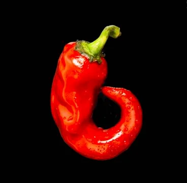 Red small pepper on black background Stock Photos