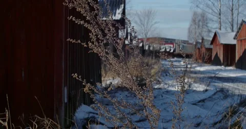 Red Small Shelters On A Small Winter Road Stock Footage 168905820