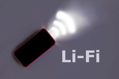 Red Smartphone on a gray studio background with light Emitting data. Li-Fi wi Stock Photos