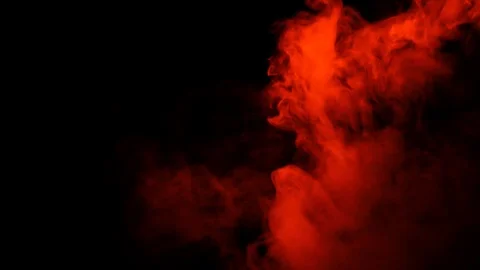 Red smoke on a black background. Stock Footage 125262926