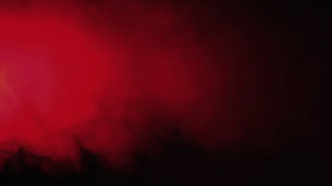 Red smoke on a black background Stock Footage 314264305