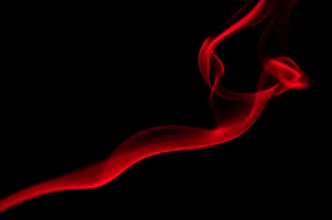 Red smoke on black background Stockfoto's