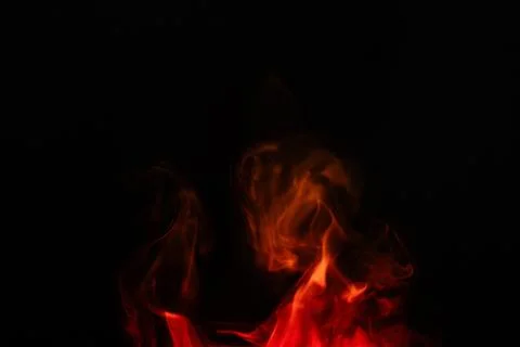 Red smoke effect. Realistic smoke with different colors on black background. 스톡 사진