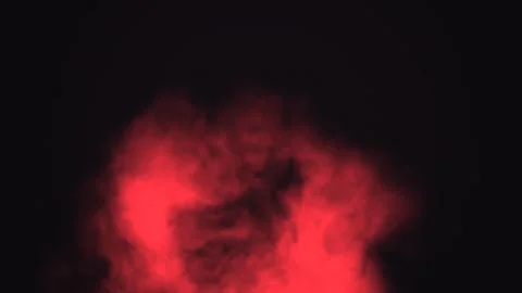 Red smoke rising in the dark background creates a Stock Footage 338121738