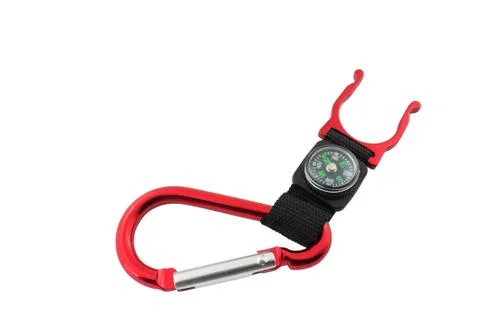 Red snap link with compass Stock Photos