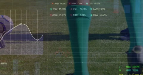 Red-socked player jostling activating AR metrics green player nudging ball aside Stock Footage 311585933