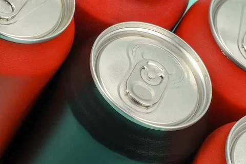 Red soda cans lined up Stock Photos