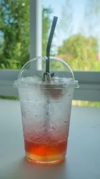 Red soda on table Foto stock