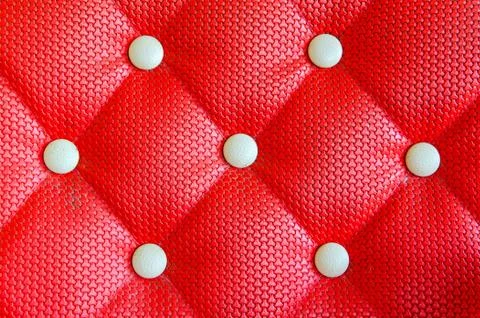 Red sofa upholstery leather pattern background Stock Photos