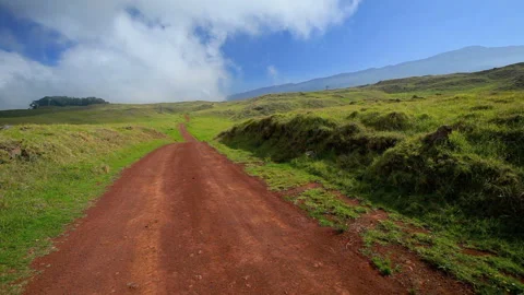 Red Soil Mana Road, Clouds, and Mauna Kea Video stock 327301148