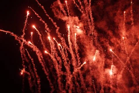Red Sparkle In Night Background Stock Photos
