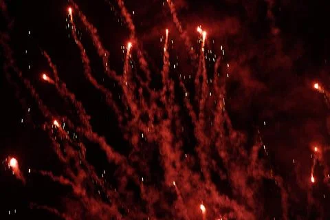 Red Sparkle In Night Background Stock Photos