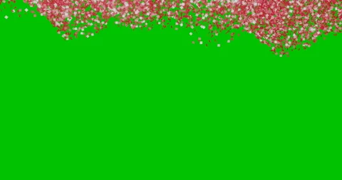 Red sparkles roll down on a green background. Looping animation. Stock Footage 118082399