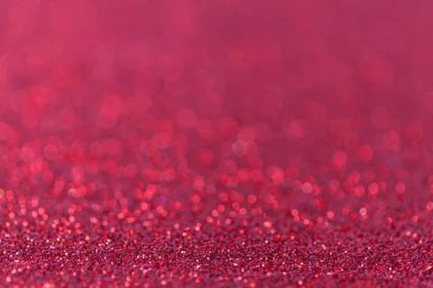 Red sparkling background from small sequins, closeup. Brilliant backdrop Stock Photos