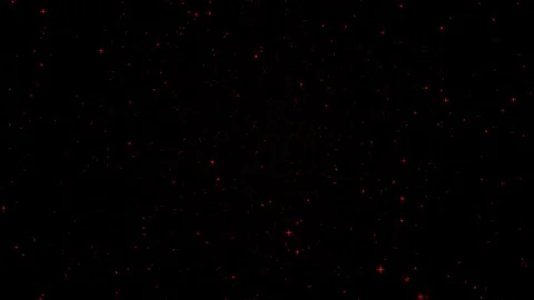 Red sparkling particle explosion expanding outward across a deep black back.. Stock Footage 334829705