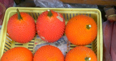 Red spikey thai fruit Stock Footage 89891476