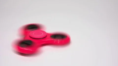 A Red spinner rotates on a white background. Stock Footage 77731290