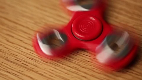 Red spinner toy. Stock Footage 75642201