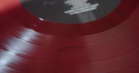 Red Spinning vinyl record front CU 库存影片 234625646