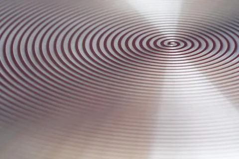 Red spiral on a blurred background. Stock Photos