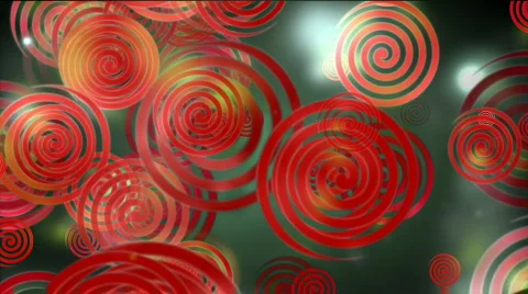 Red spirals on green motion background bi2025G Stock Footage 600720