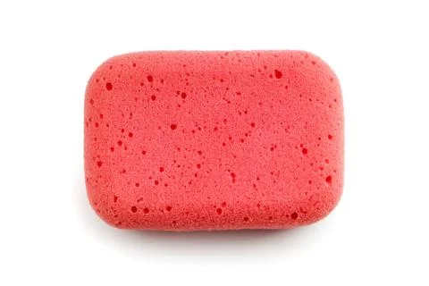 Red sponge isolated on white background. Top view Stock Photos