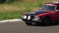 Red sport-looking vintage car Mercedes 450 SLC in international racing HD Footage