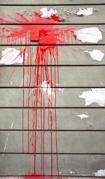 Red spot on a gray wall Foto stock