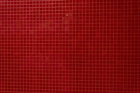 Red square background mosaic for facing the walls of the house, bathroom Stock Photos