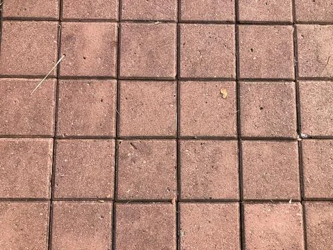 Red square brick paver texture viewed from above Stock Photos